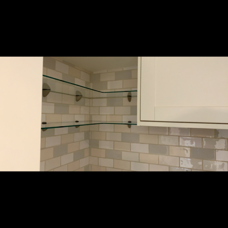 glass shelf's fitted with chrome brackets